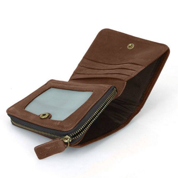 Foto de billetera vertical vintage bifold con cierre de cuero natural mostrando su vista interior de bolsillos en color marrón